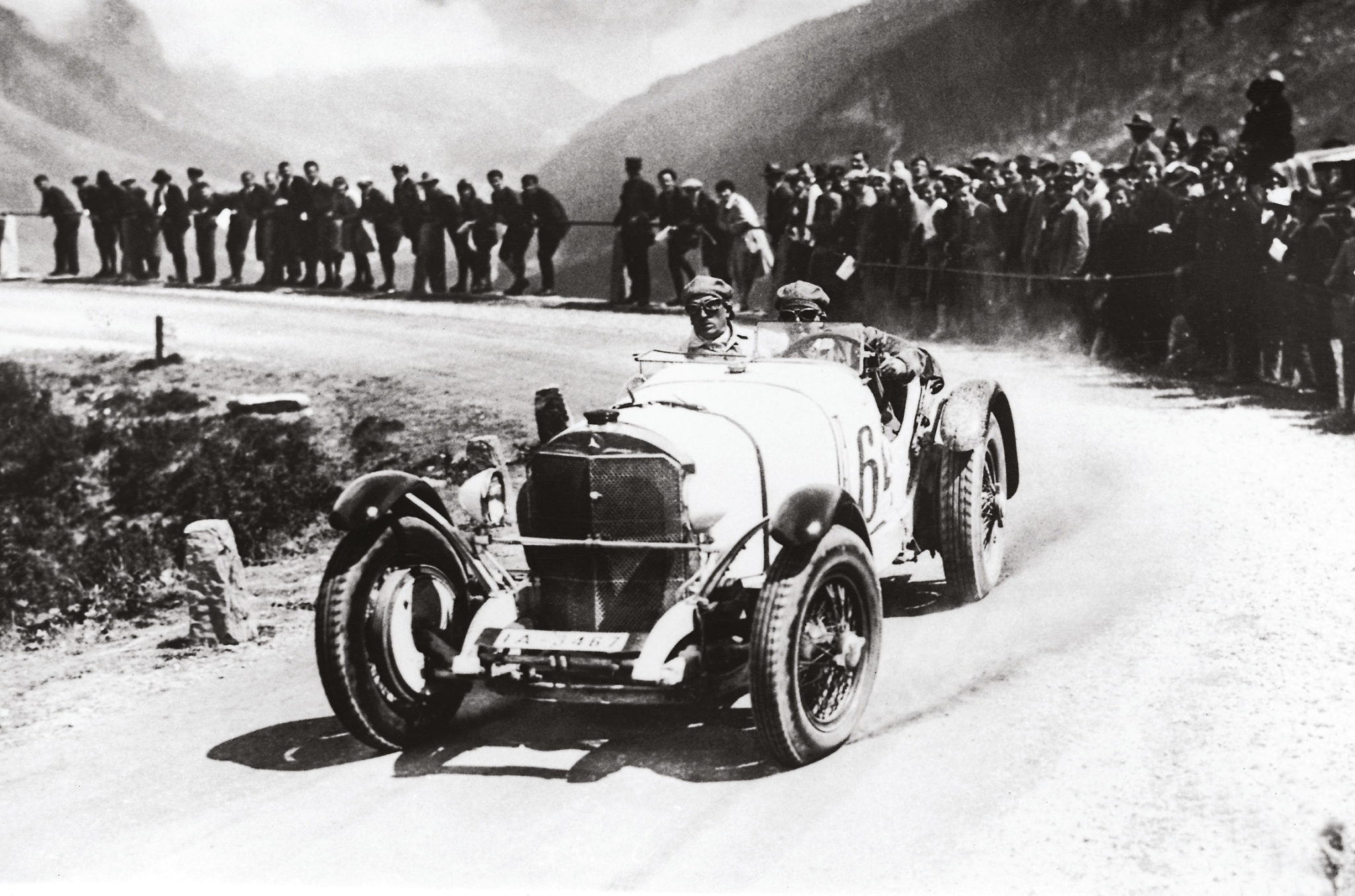 Rudi Caracciola wrestles his 7-litre Mercedes SSK up the Klausen climb in 1930, winning the sports car award