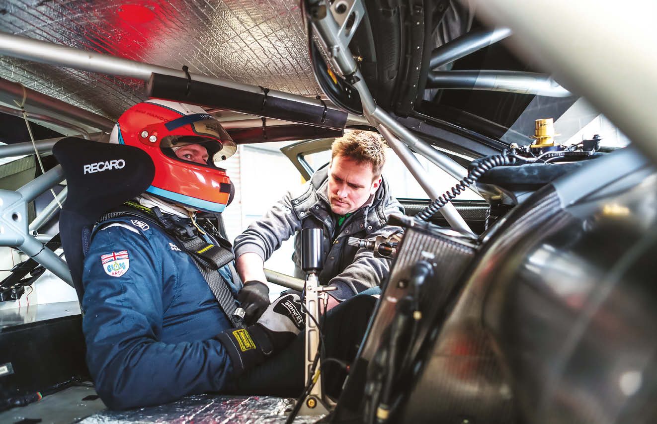 Hancock gets buckled in ahead of his shakedown with the car at Anglesey Circuit