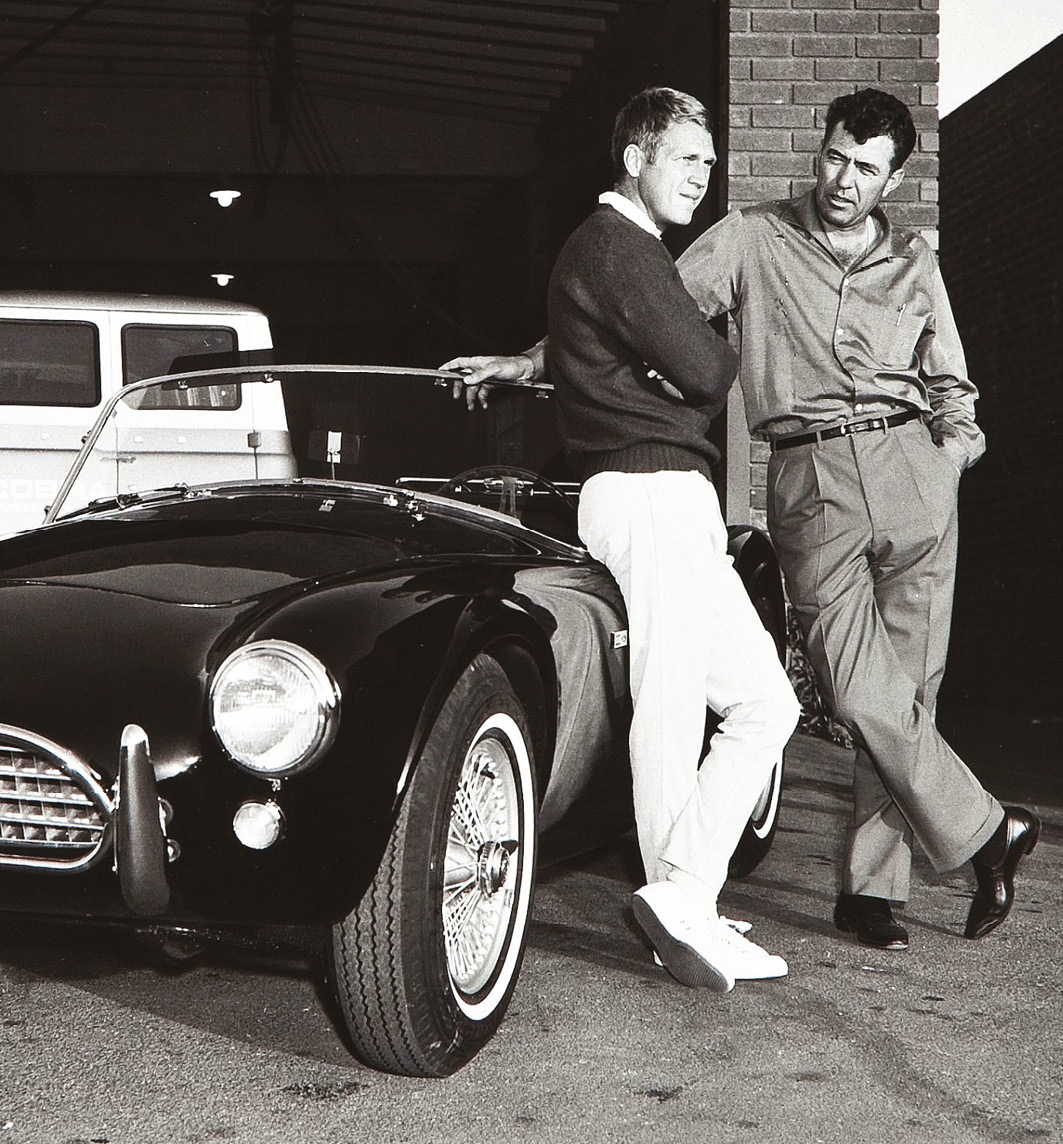 Pictured with Steve McQueen, Shelby, right, sought to beat Ferrari