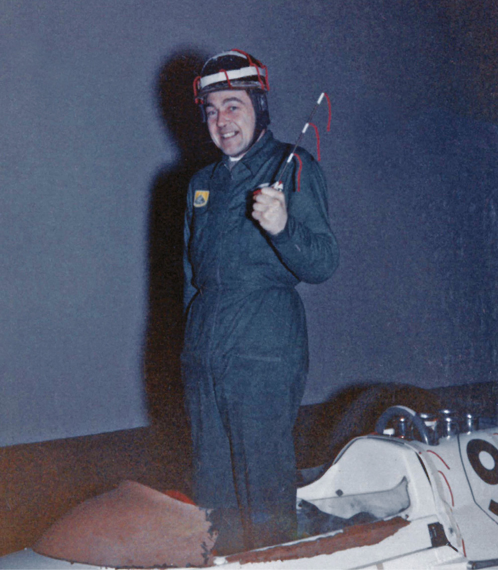 Lotus 29 screen test at MIRA; mechanic Jim Endruweit with wool-tufted helmet and wand used as a low-tech way to monitor airflow