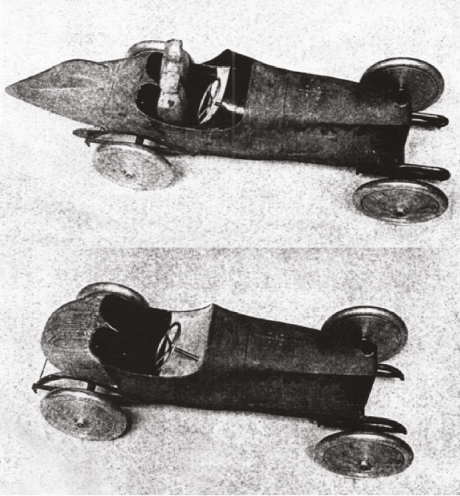 Before and after models of a 1914 Peugeot. Note the elongated rear of the reworked design (top)