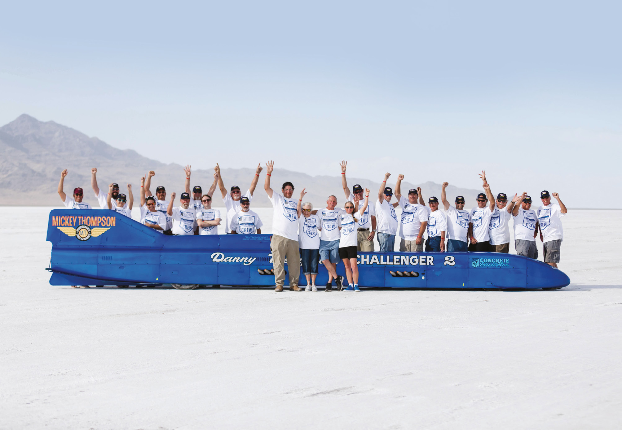 The volunteer-led team behind Challenger II celebrate, with Mickey Thompson’s name still emblazoned on the car