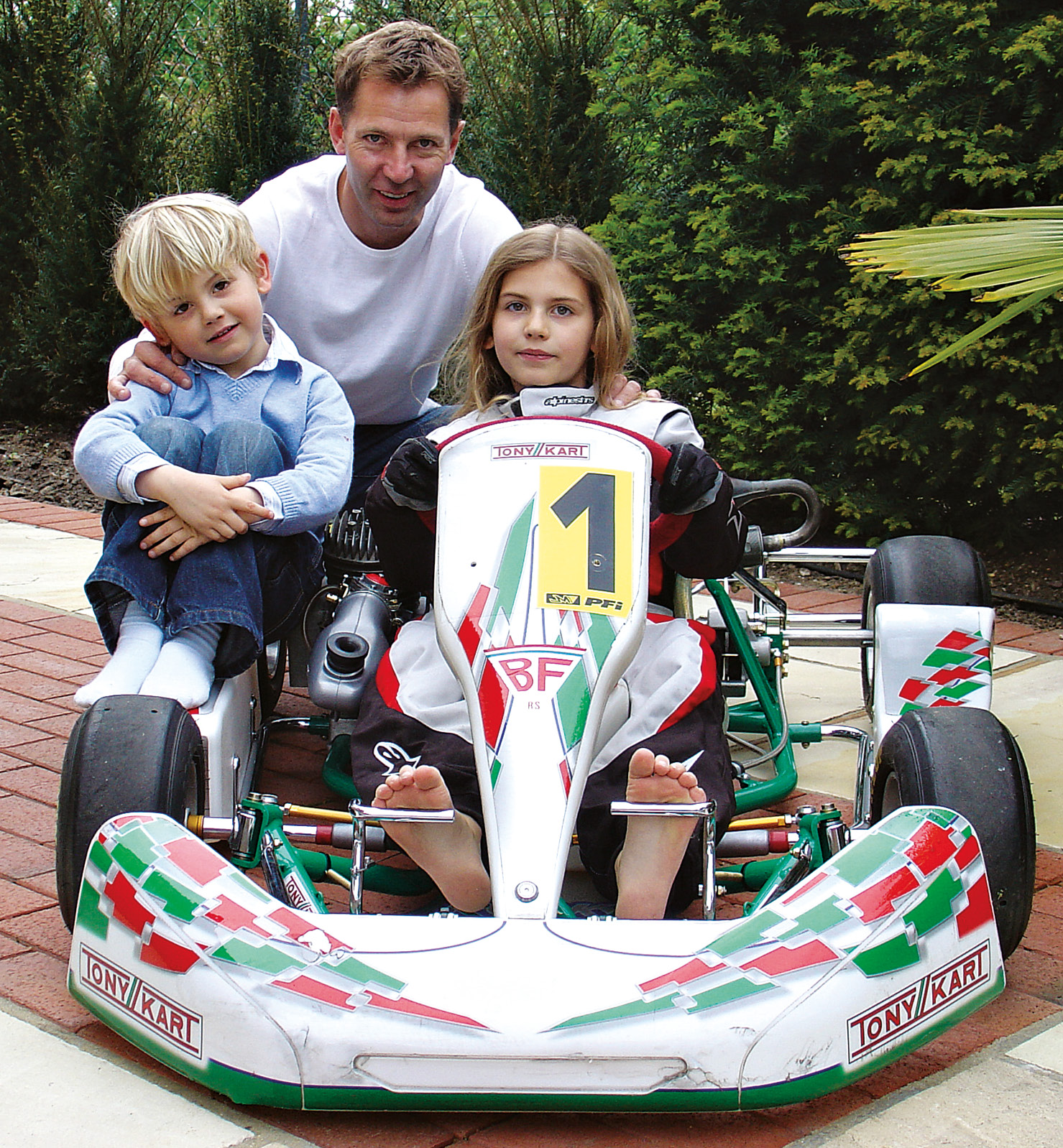 Dean Hawkey with a young Esmee, and her younger brother, Ethan. Karting first sparked the family’s racing passion