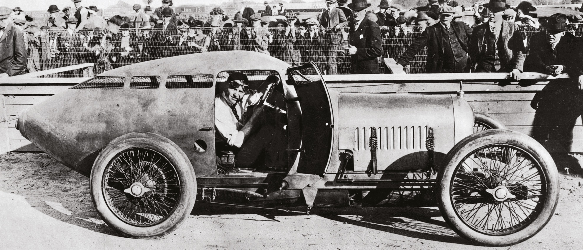 Oldfield at the wheel of the Golden Submarine during a promotional event at Daytona in 1922