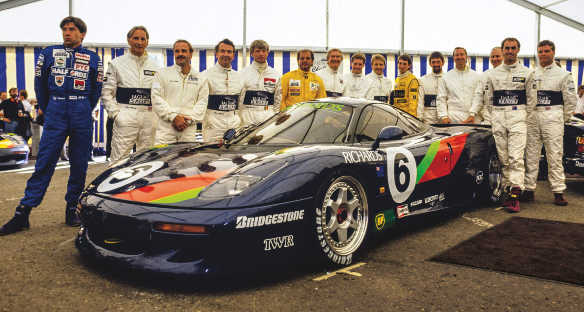 The grid at Spa in 1991. From left: Tiff Needell, John Watson, Cor Euser, Bob Wollek, Pierre Dieudonné, Armin Hahne, Win Percy, Jeff Allam, Will Hoy, Ian Flux, David Leslie, Jim Richards, Thierry Tassin, David Brabham and Derek Warwick