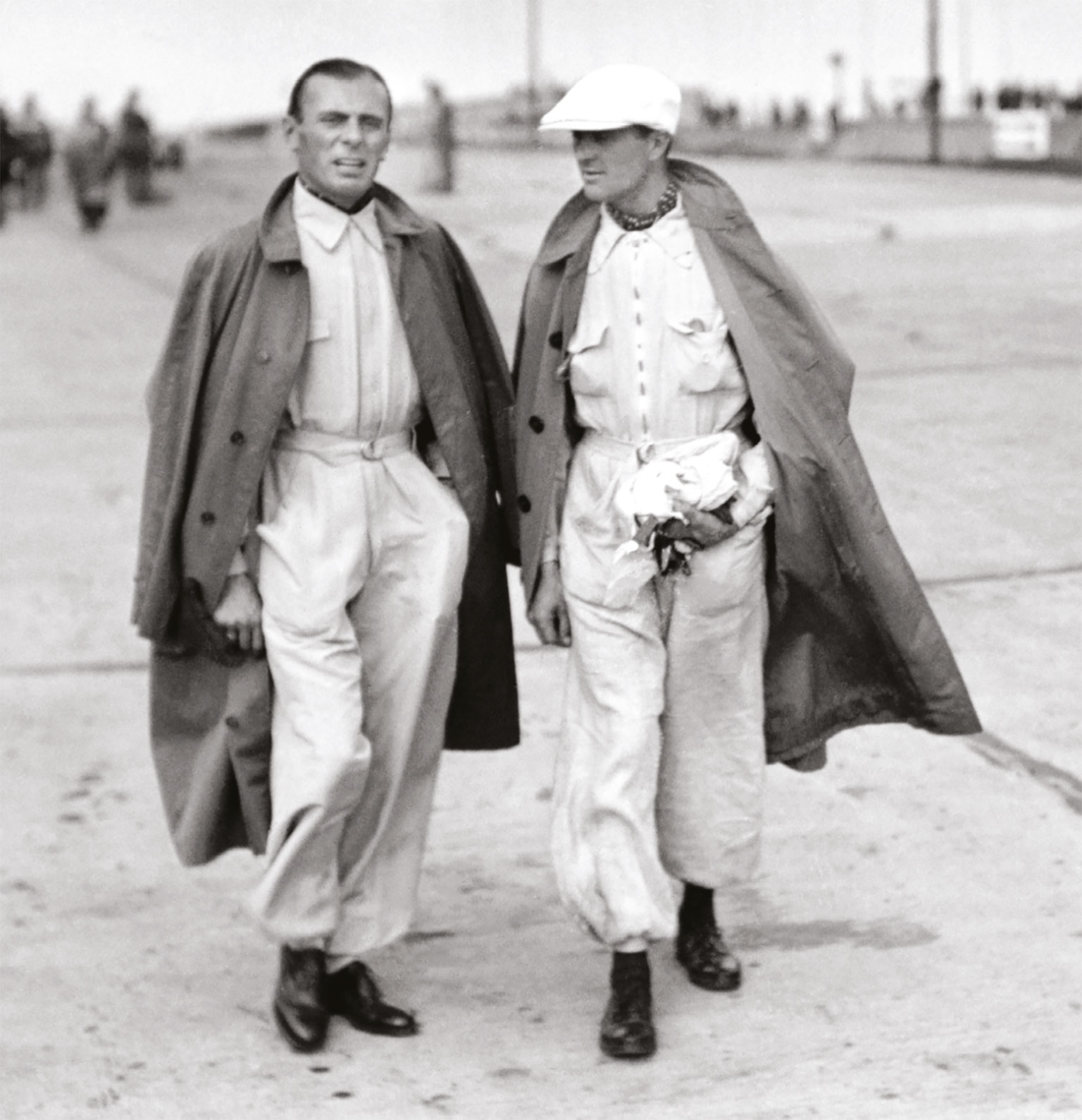 Auto Union’s Varzi (left) chats with Mercedes racer Louis Chiron