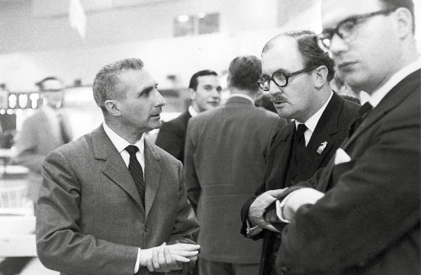 John Ogier (middle) chats to Dr Feyles Pinin Farina (left) at the1962 London Show